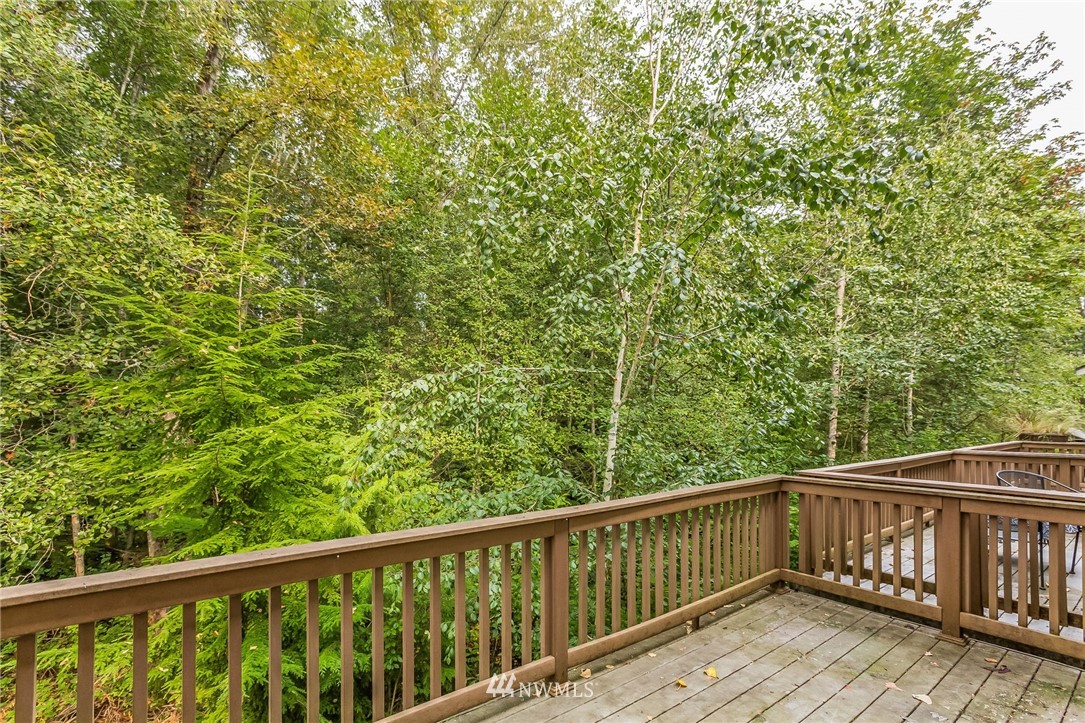 1129 215th Place Southeast Bothell, WA 98021 - Photo 8 of 20 a view of balcony with wooden floor