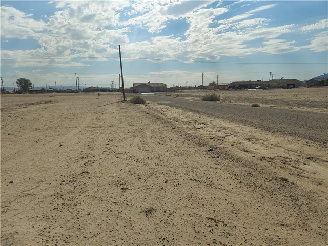 a view of a beach with a big yard