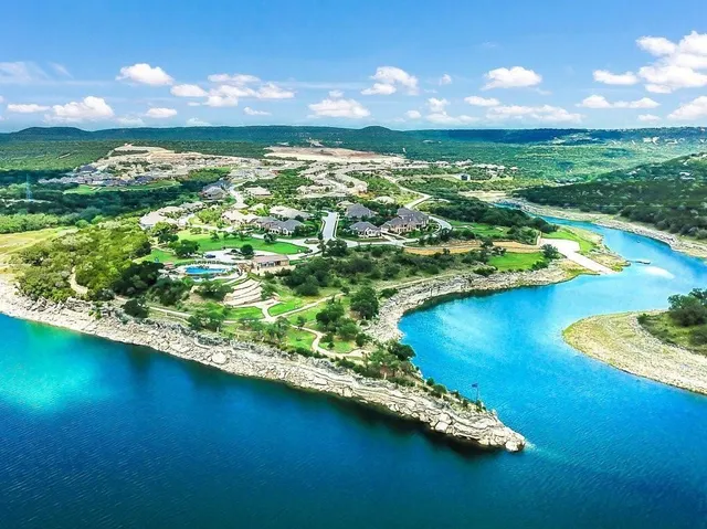 a view of a lake with a city