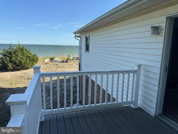 a balcony with wooden floor