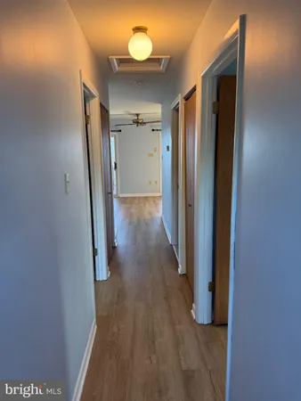 a view of entryway with wooden walls