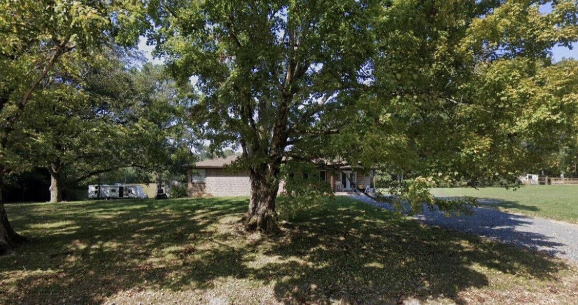 842 Kile Lake Road Southeast Cleveland, TN 37323 - Photo 1 of 1 a backyard of a house with lots of green space
