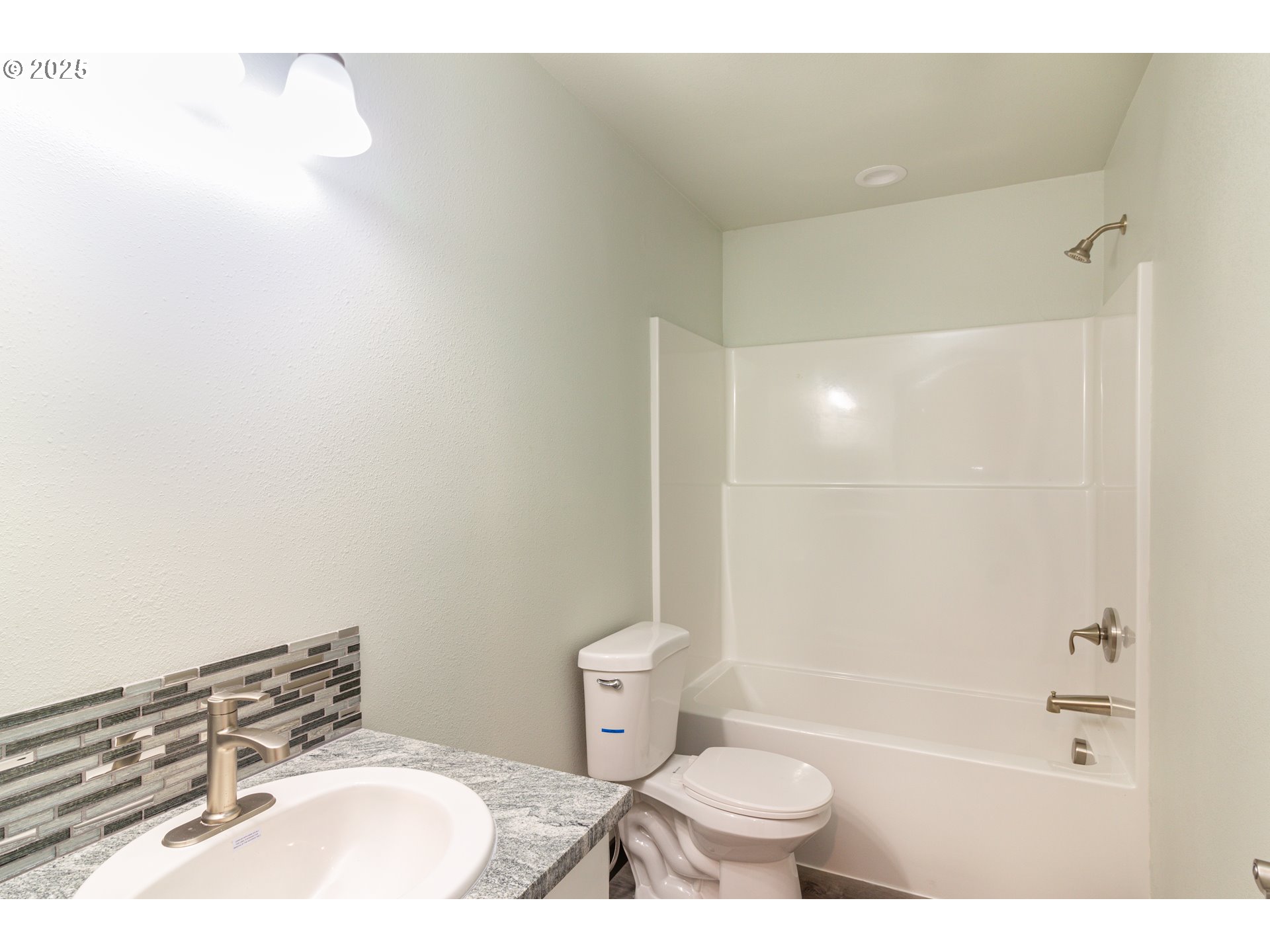 435 Northeast Sloan Street Stanfield, OR 97875 - Photo 12 of 24 a bathroom with a sink and a toilet