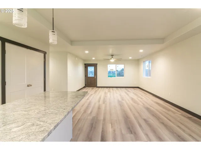 a view of an empty room and window