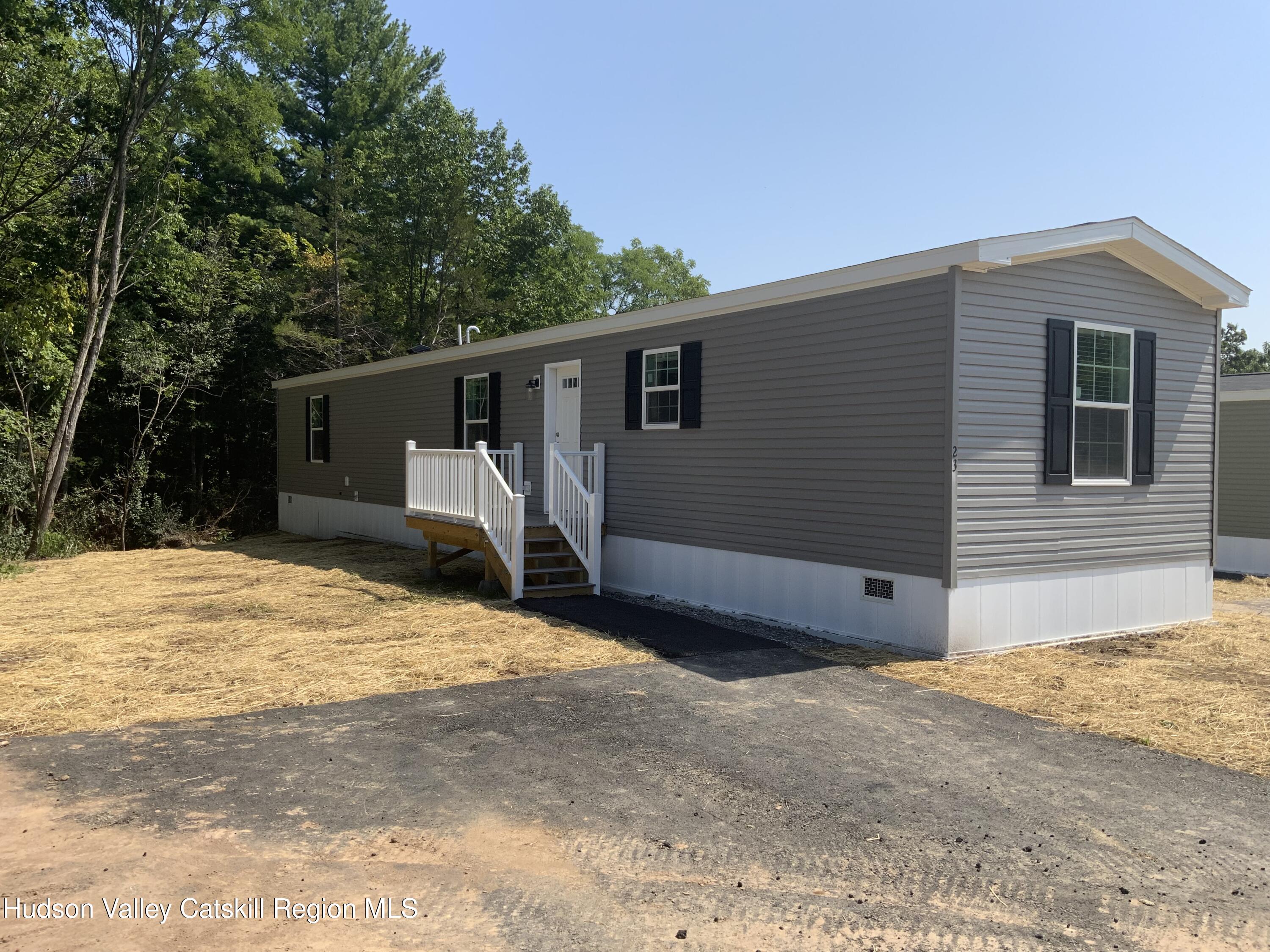 1154 Us-9, Unit 23 Hudson, NY 12534 - Photo 1 of 23 a view of a backyard of the house