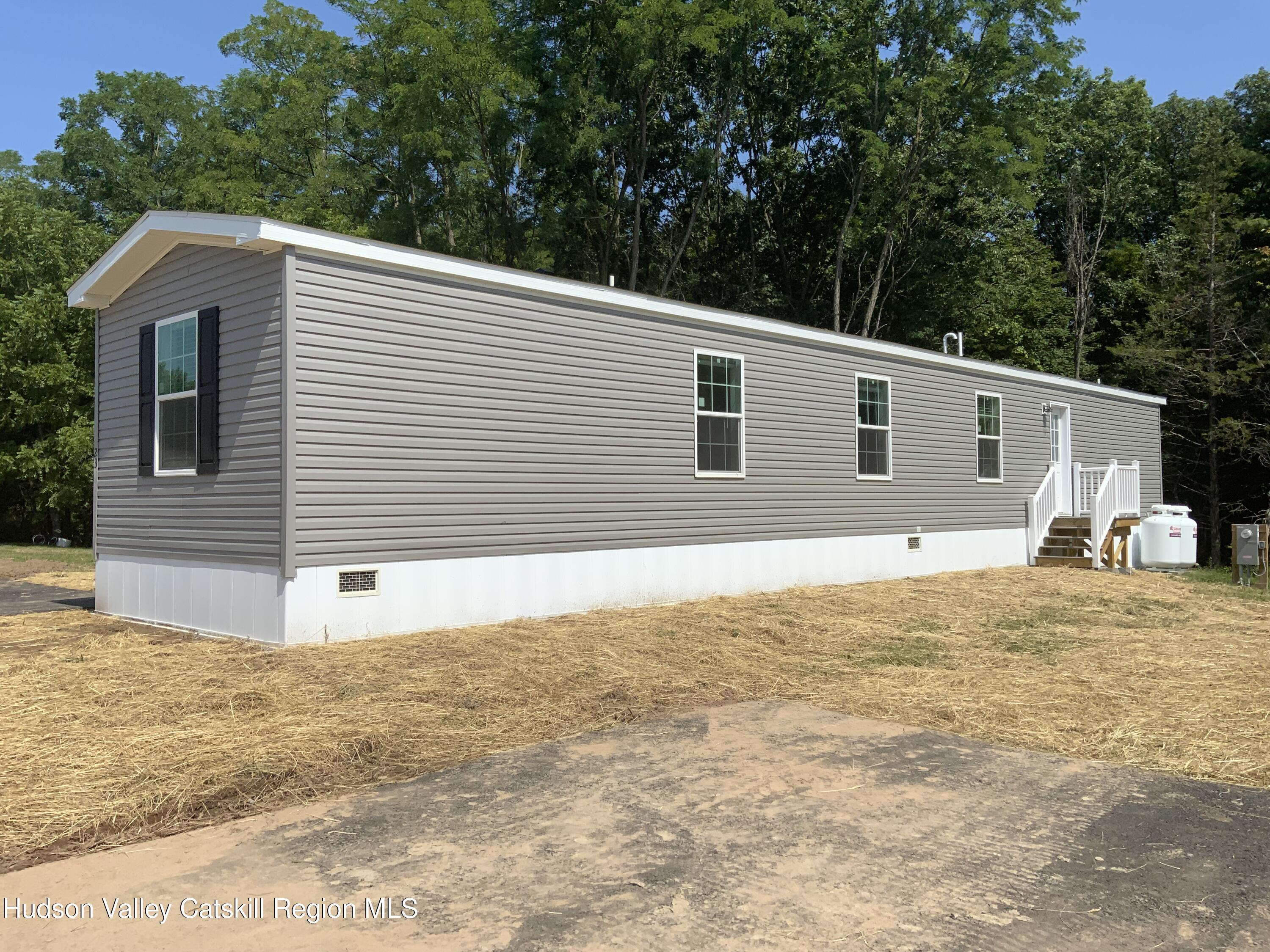1154 Us-9, Unit 23 Hudson, NY 12534 - Photo 2 of 23 a view of a house with a outdoor space