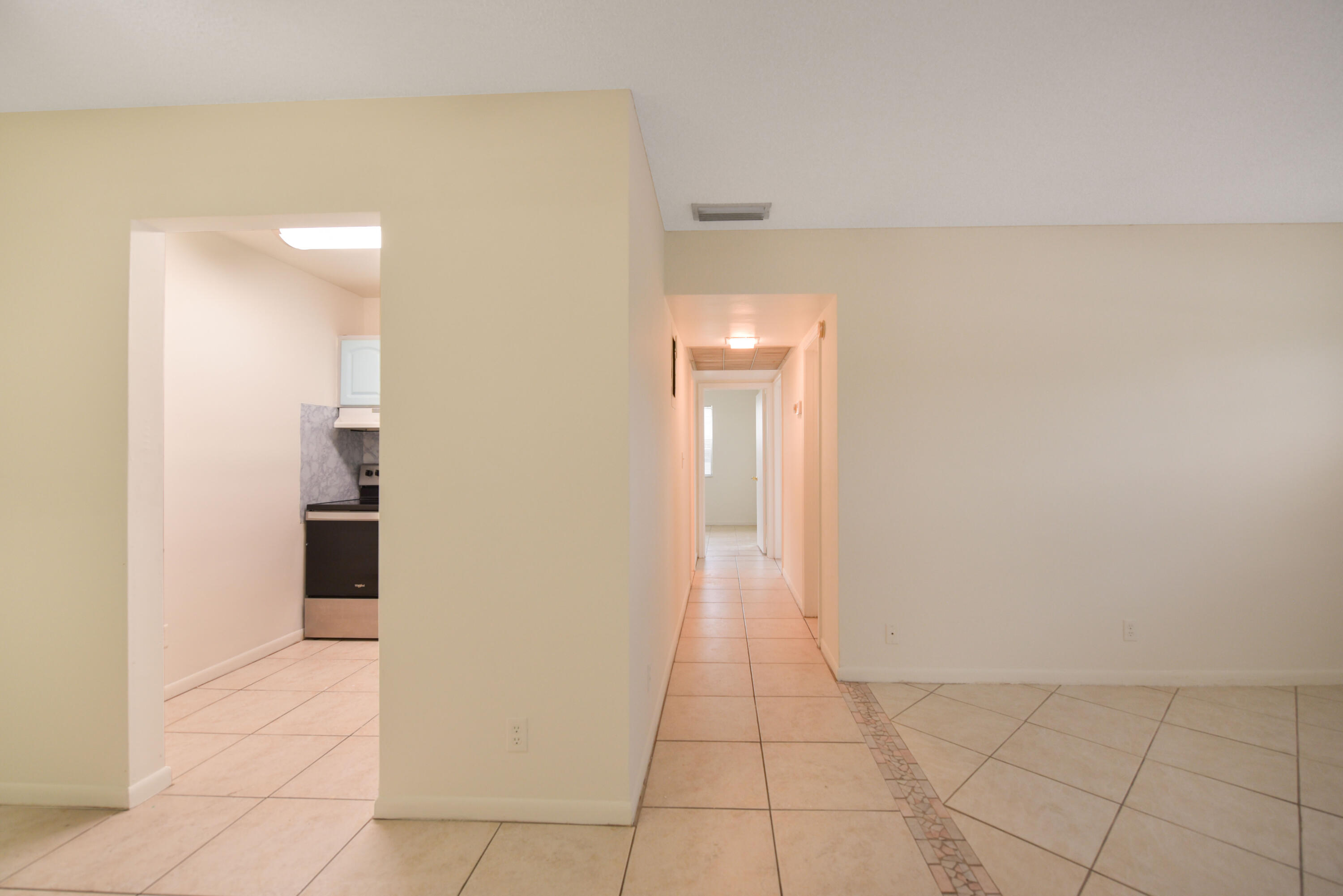 298 Southwest 6th Street, Unit 110 Boca Raton, FL 33432 - Photo 13 of 27 a view of a room with an empty space