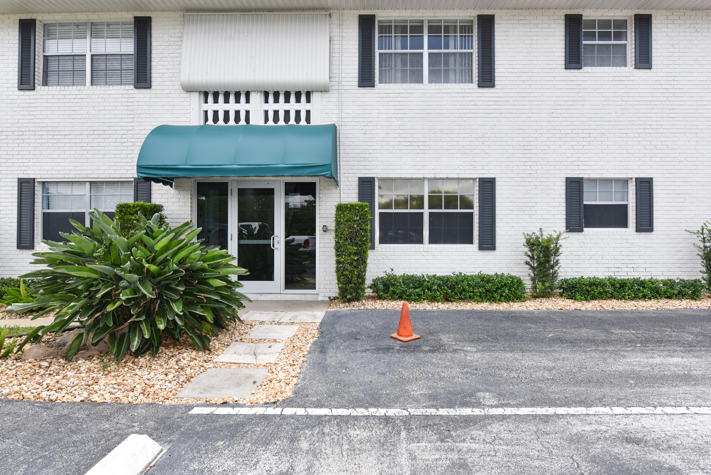 298 Southwest 6th Street, Unit 110 Boca Raton, FL 33432 - Photo 3 of 27 a front view of a building