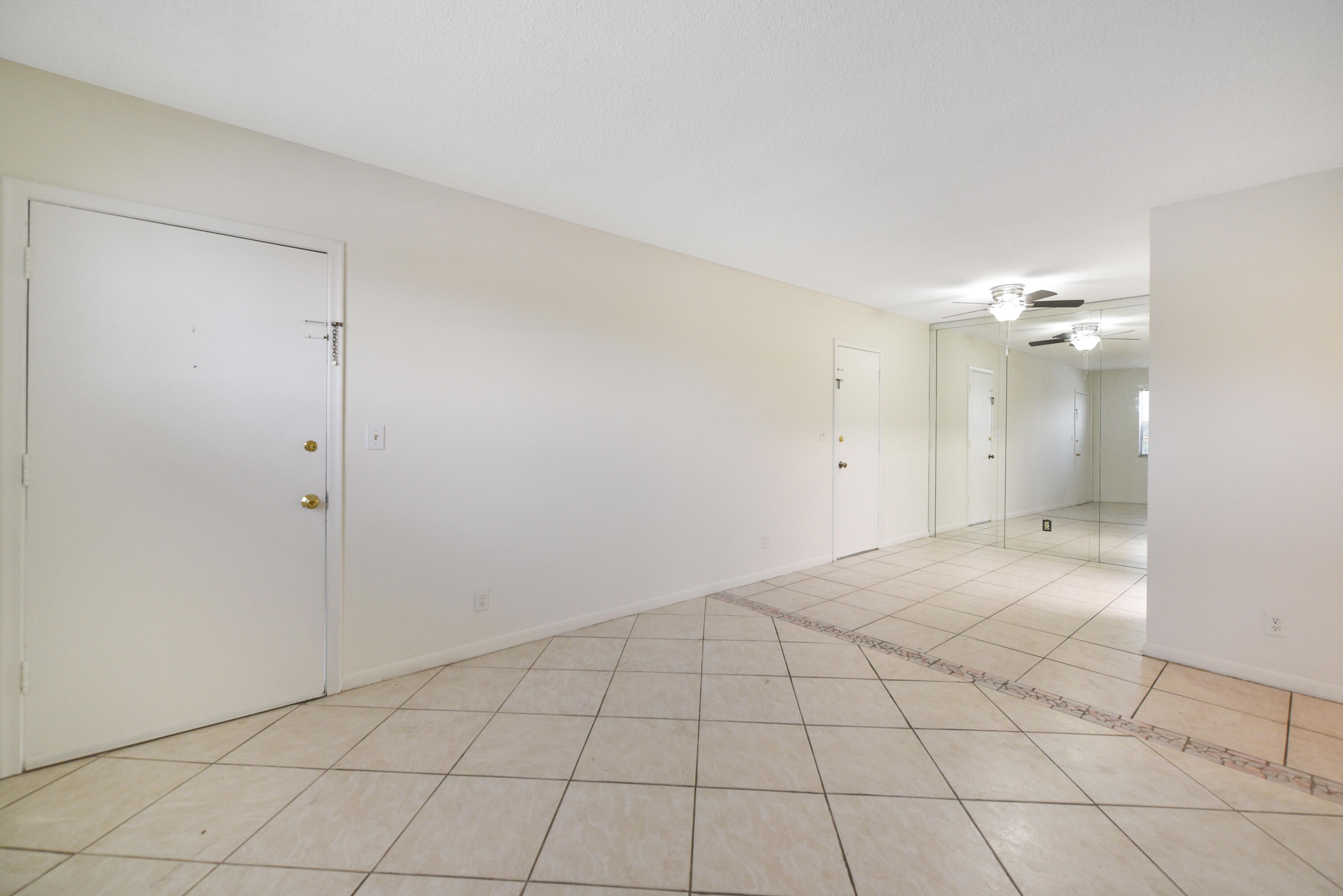 298 Southwest 6th Street, Unit 110 Boca Raton, FL 33432 - Photo 9 of 27 a view of an empty room