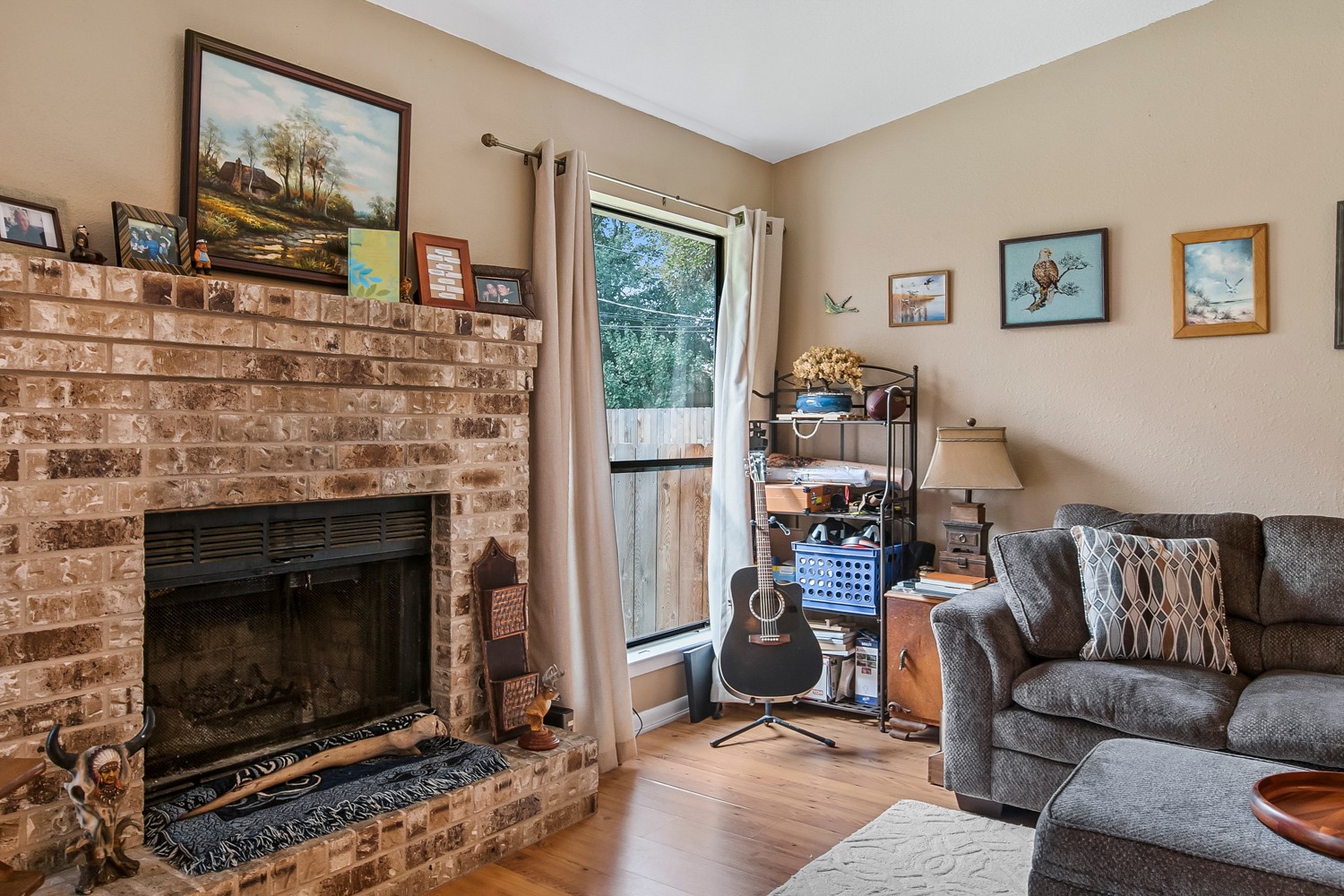 6029 Old Fredericksburg Road, Unit A Austin, TX 78749 - Photo 18 of 20 a living room with furniture and a fireplace