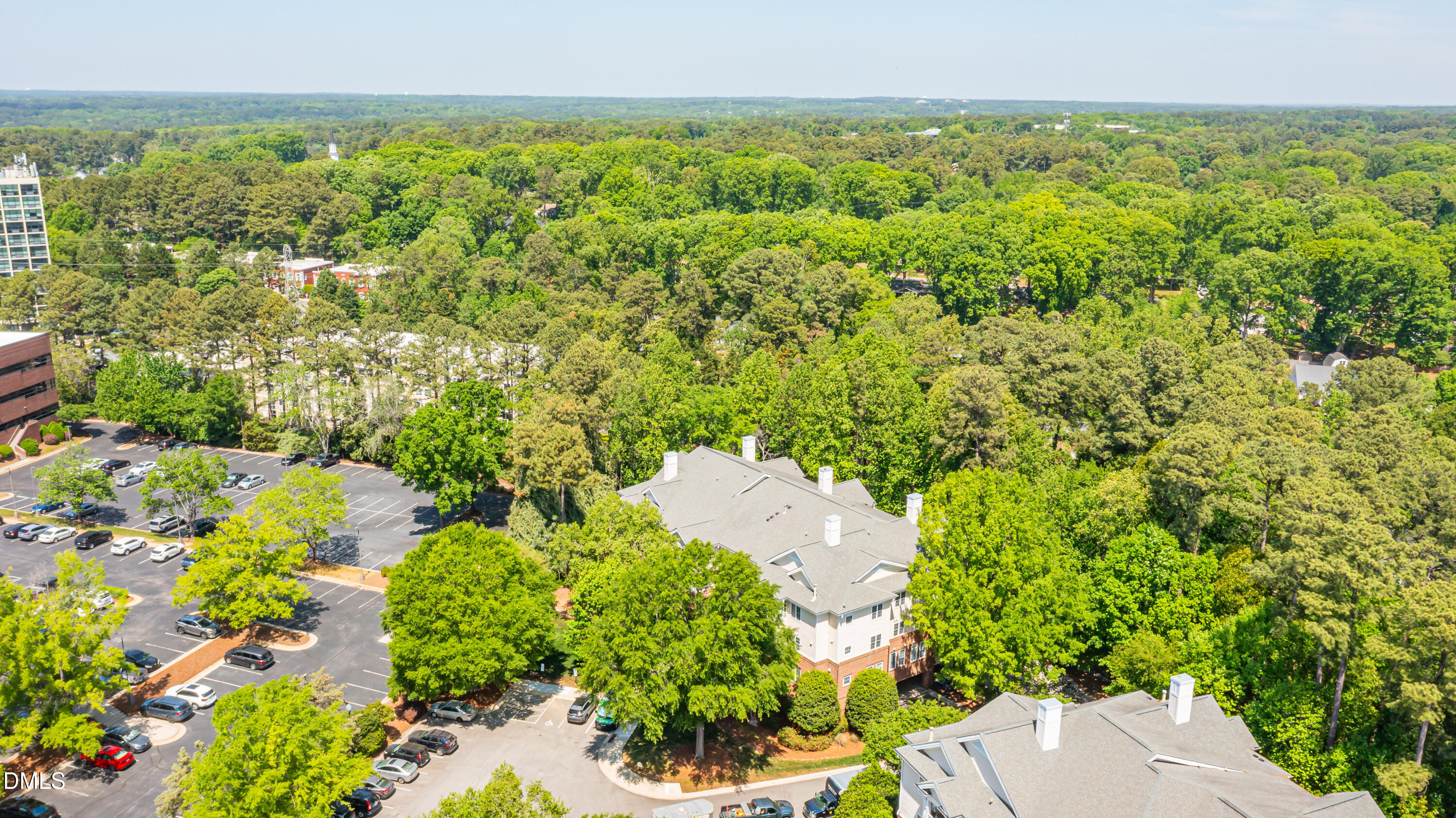 116 Northbrook Drive, Unit 305 Raleigh, NC 27609 - Photo 13 of 43 an aerial view of a house with a yard