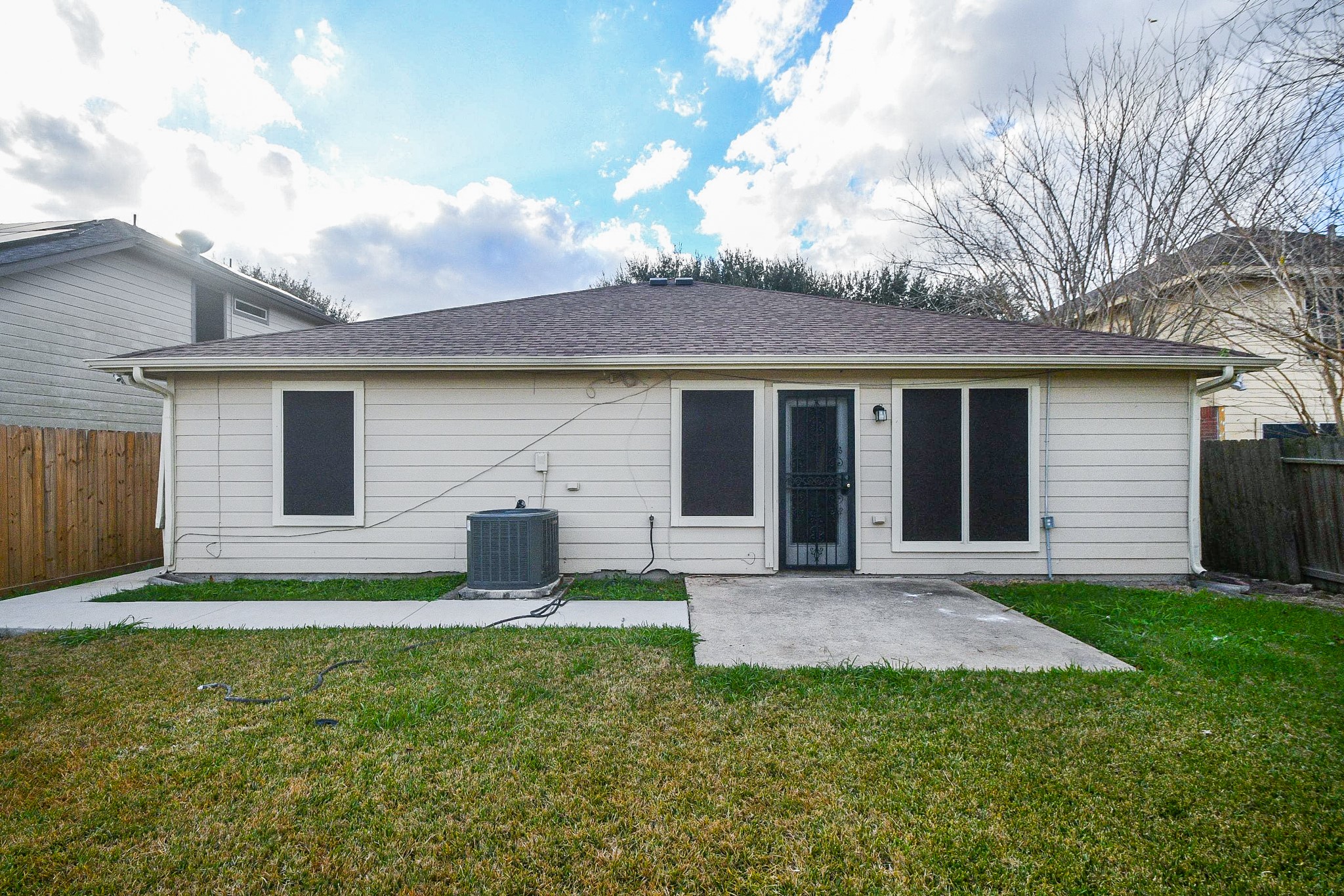 11915 Rhema Lane Houston, TX 77048 - Photo 19 of 20 a front view of house with yard and green space