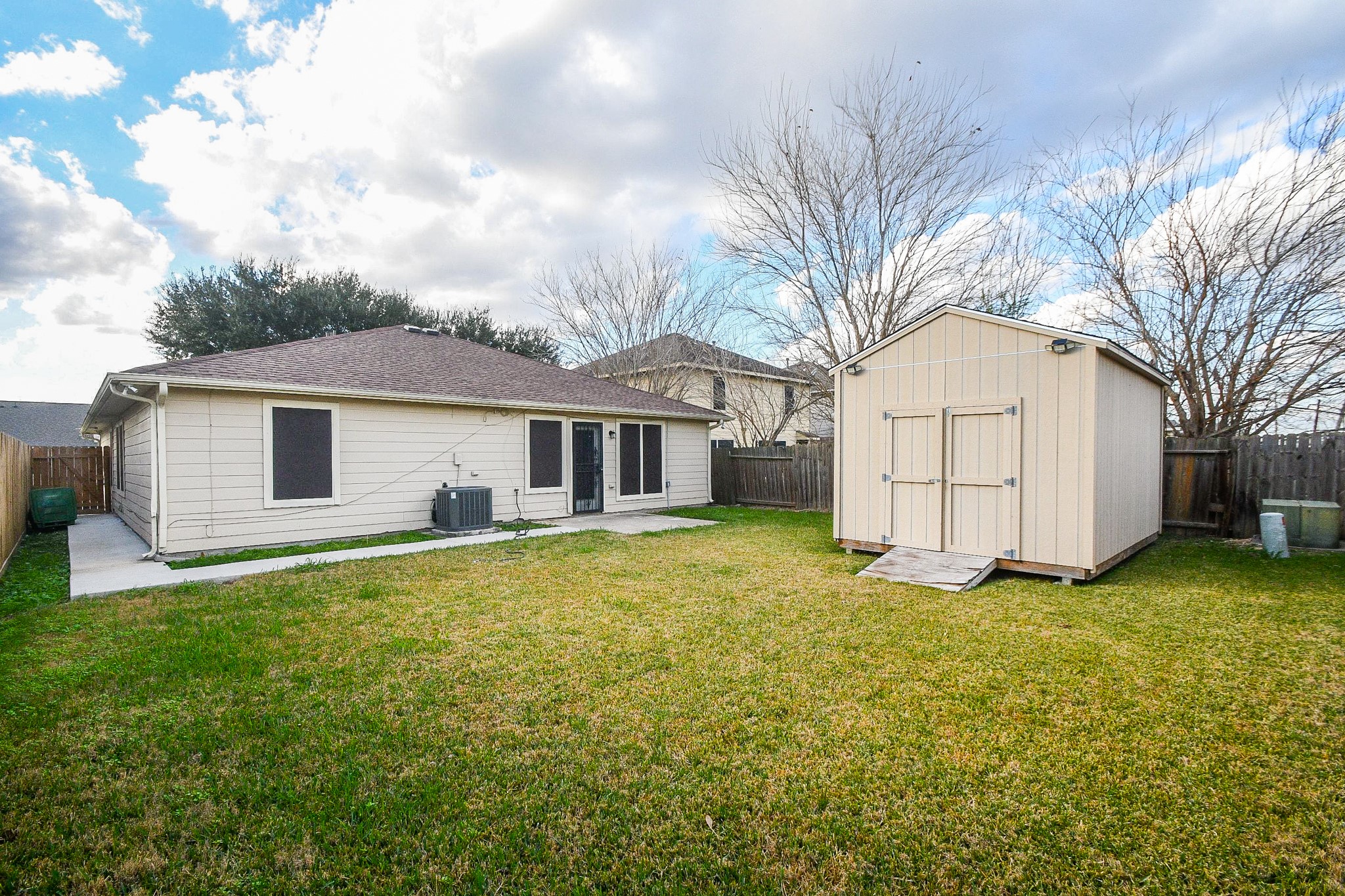 11915 Rhema Lane Houston, TX 77048 - Photo 20 of 20 a view of a yard with a house