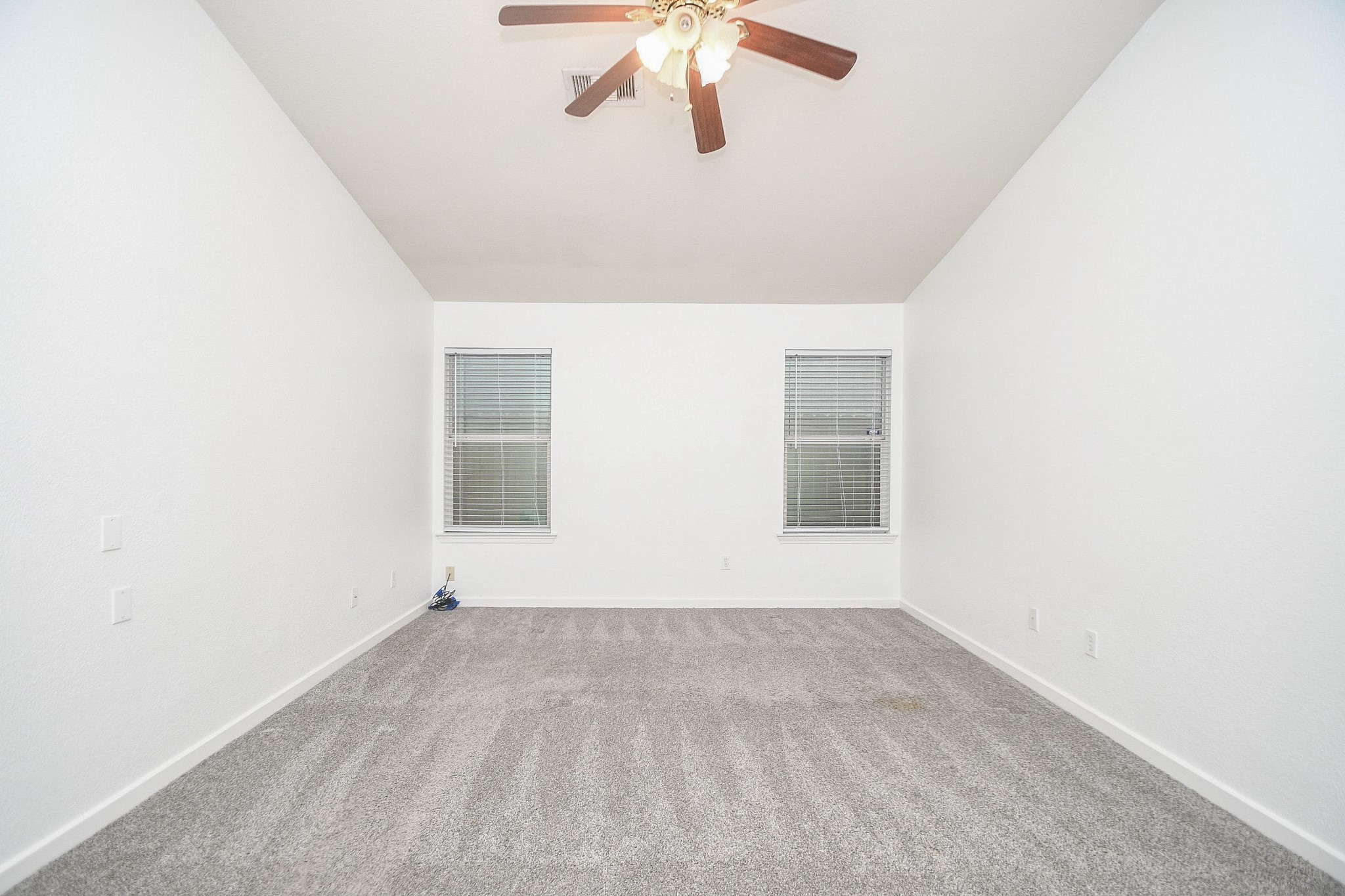 11915 Rhema Lane Houston, TX 77048 - Photo 9 of 20 an empty room with a window