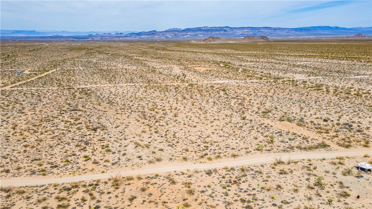 Lot 7 South Sherry Road Yucca, AZ 86438 - Photo 12 of 20 View of rural area with a mountainous background and a desert landscape
