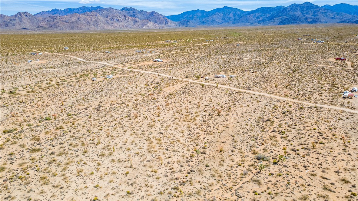 Lot 7 South Sherry Road Yucca, AZ 86438 - Photo 2 of 20 View of rural area with a mountain backdrop and a desert landscape