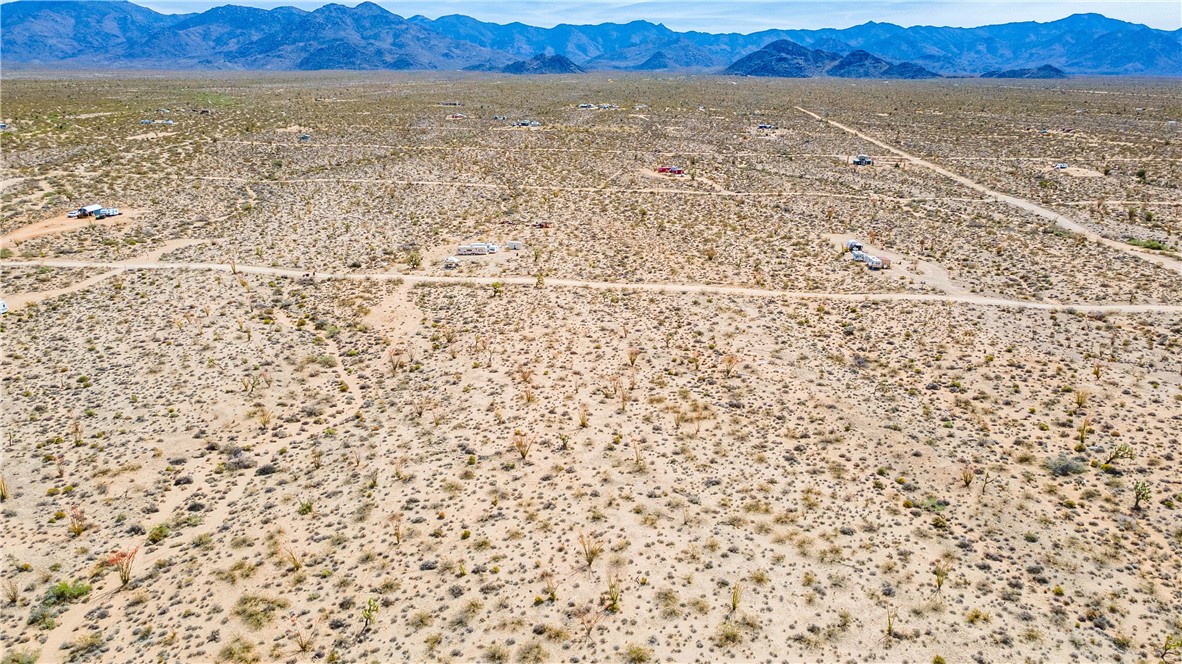 Lot 7 South Sherry Road Yucca, AZ 86438 - Photo 4 of 20 Drone / aerial view of a mountainous background and a desert landscape