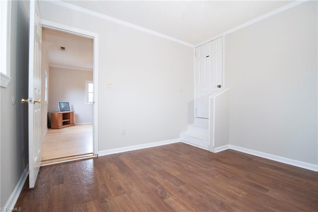 5771 Styers Ferry Road Clemmons, NC 27012 - Photo 12 of 19 Unheated bonus room off of master with stairs to walk-up attic