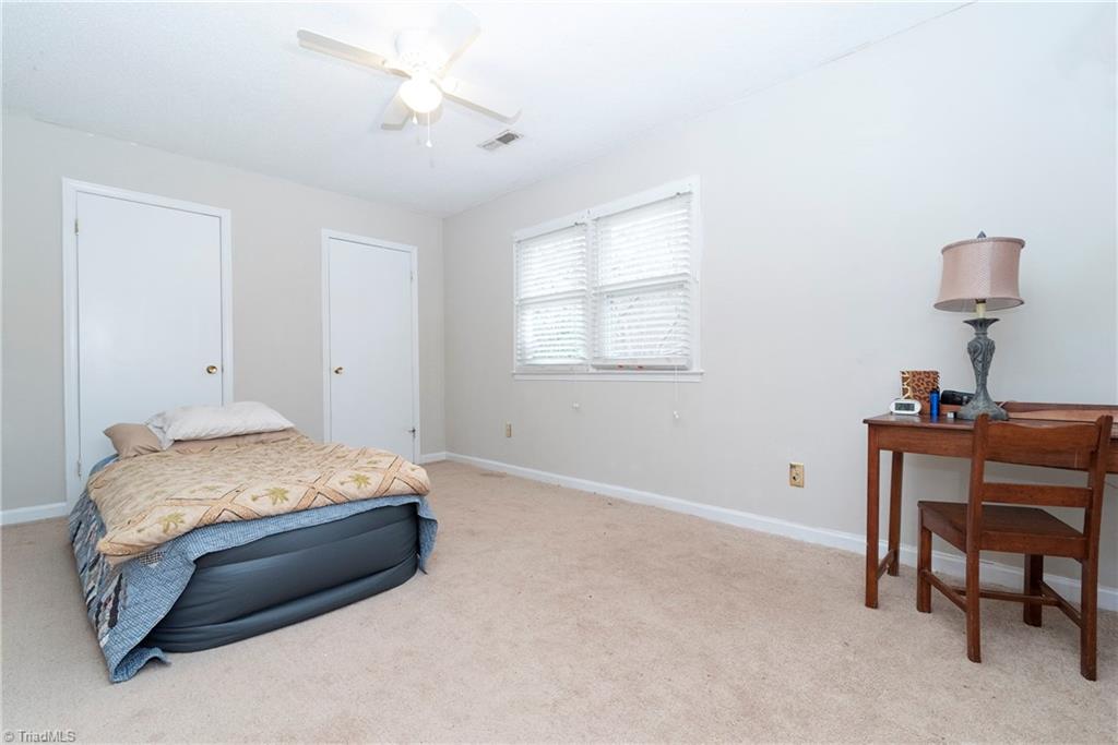 5771 Styers Ferry Road Clemmons, NC 27012 - Photo 13 of 19 Bedroom One with two closets.