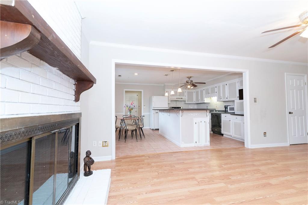 5771 Styers Ferry Road Clemmons, NC 27012 - Photo 5 of 19 Living room into Kitchen/Dining Area