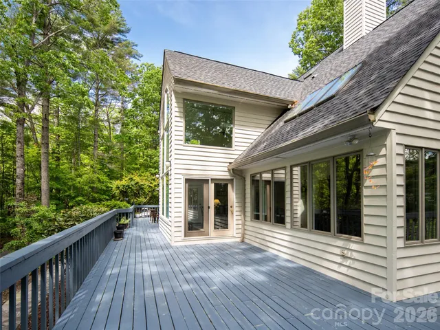 a view of a house with porch and wooden floor