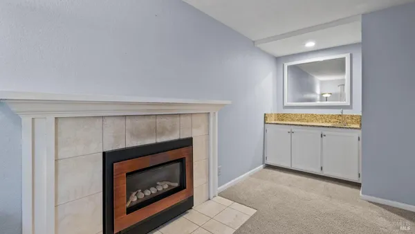 a view of kitchen with furniture and window