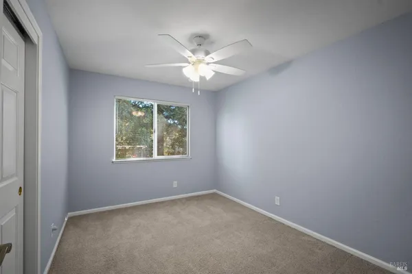 a view of backyard with green space