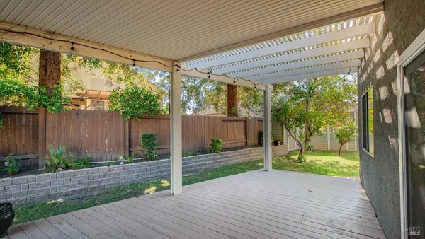 a view of a back yard of the house