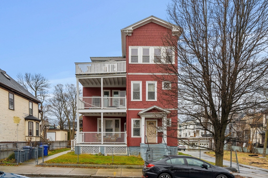 10 King Street, Unit 2 Boston, MA 02122 - Photo 1 of 17 a front view of a residential apartment building with a yard