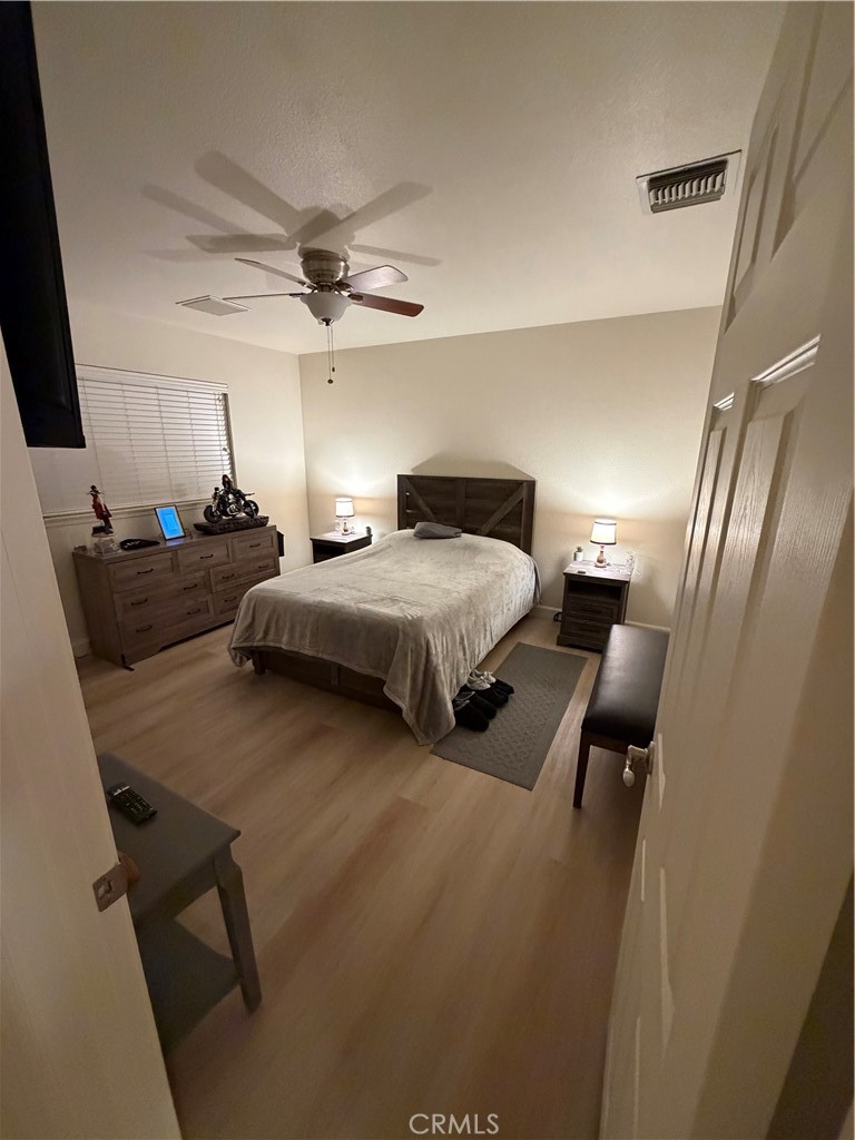 209 Kimberly Lane Ridgecrest, CA 93555 - Photo 27 of 62 a bedroom with bed and window