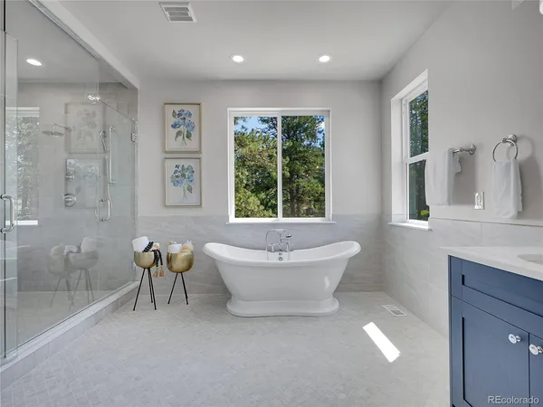 a bathroom with a bathtub and a toilet