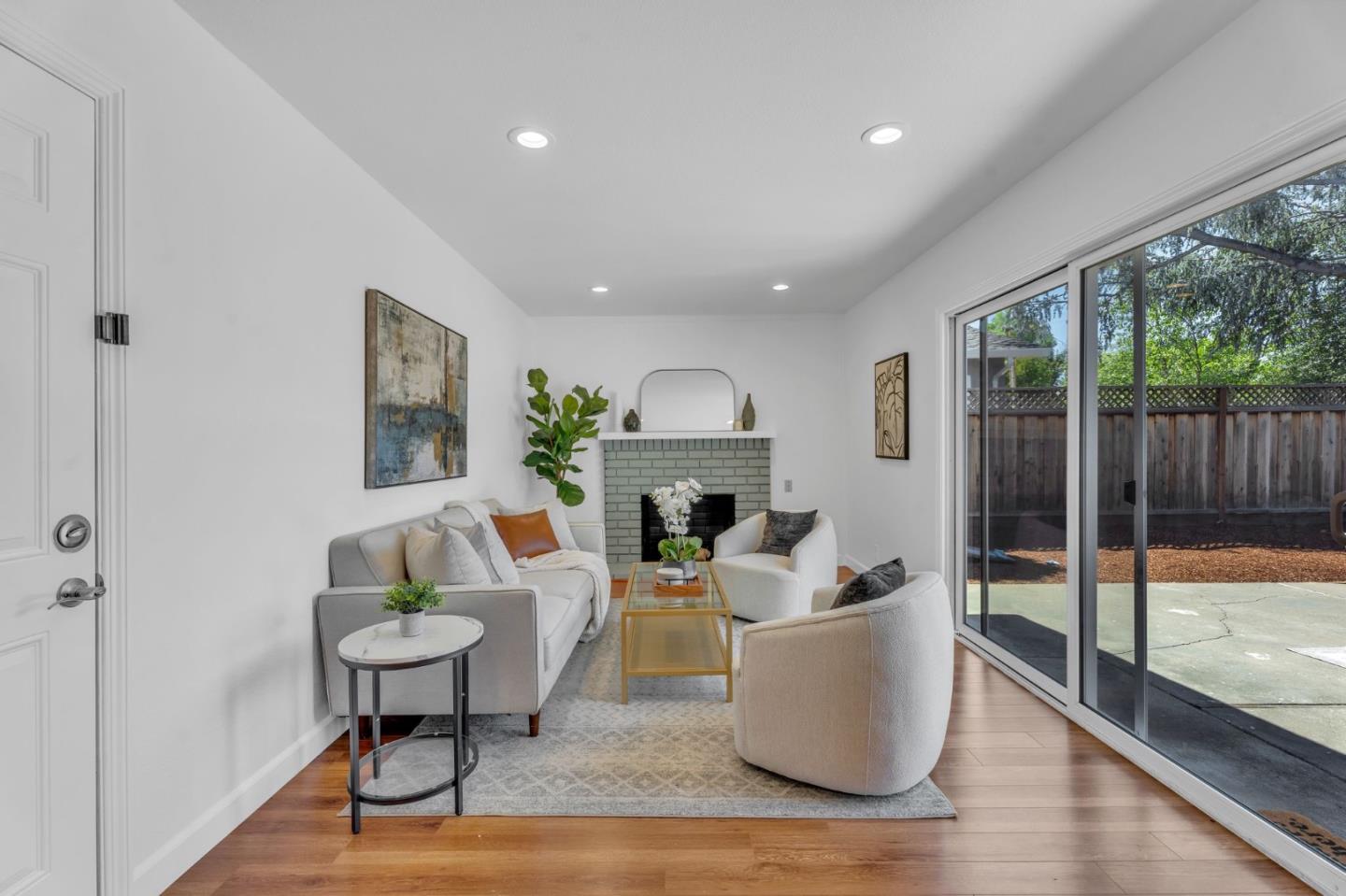 1165 Nadine Drive Campbell, CA 95008 - Photo 15 of 66 a living room with furniture and a fireplace