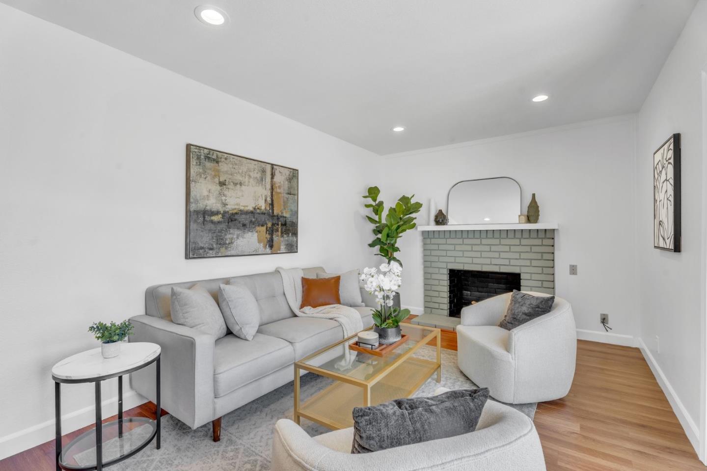 1165 Nadine Drive Campbell, CA 95008 - Photo 16 of 66 a living room with furniture and a fireplace