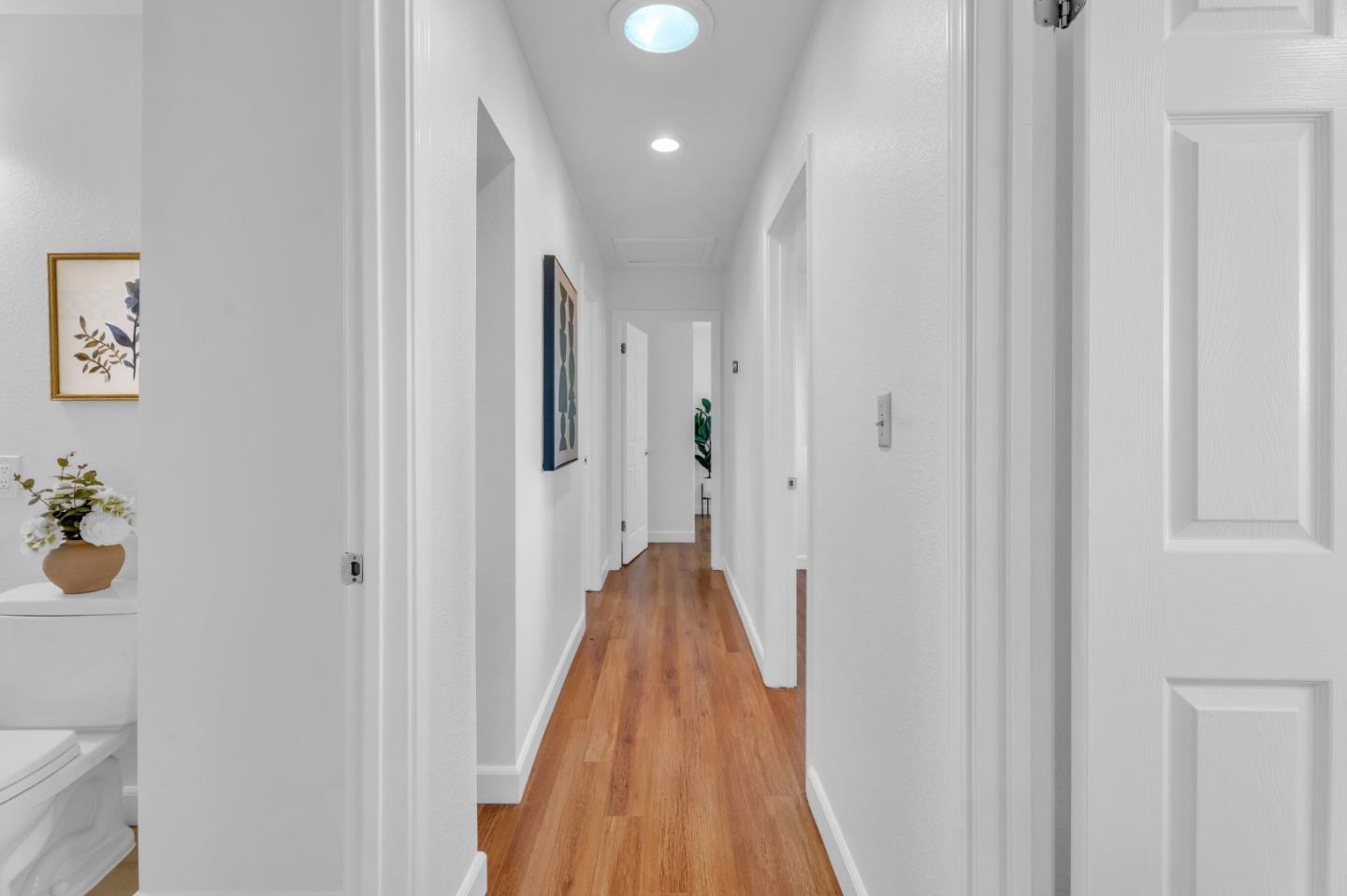 1165 Nadine Drive Campbell, CA 95008 - Photo 19 of 66 a view of a hallway with wooden floor and staircase