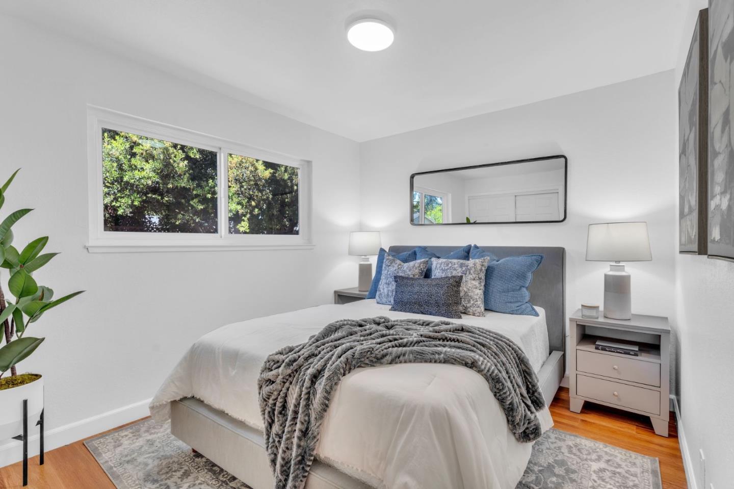 1165 Nadine Drive Campbell, CA 95008 - Photo 27 of 66 a bedroom with a bed and a window