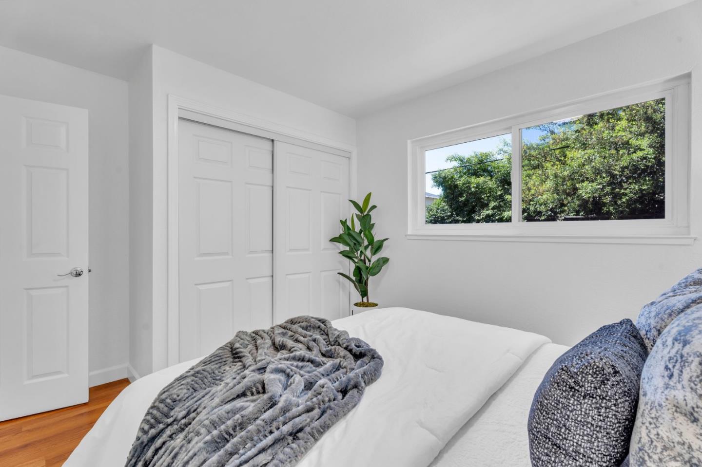 1165 Nadine Drive Campbell, CA 95008 - Photo 28 of 66 a bedroom with a bed and a window