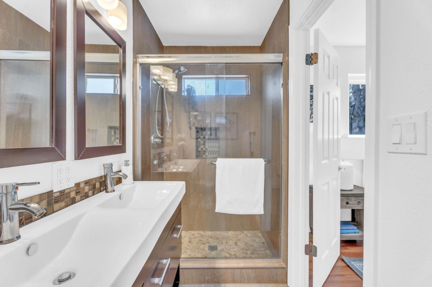 1165 Nadine Drive Campbell, CA 95008 - Photo 31 of 66 a bathroom with a tub sink and mirror