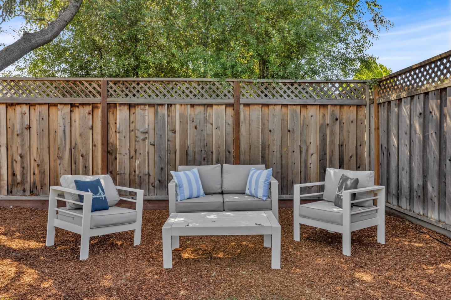 1165 Nadine Drive Campbell, CA 95008 - Photo 41 of 66 a backyard of a house with table and chairs