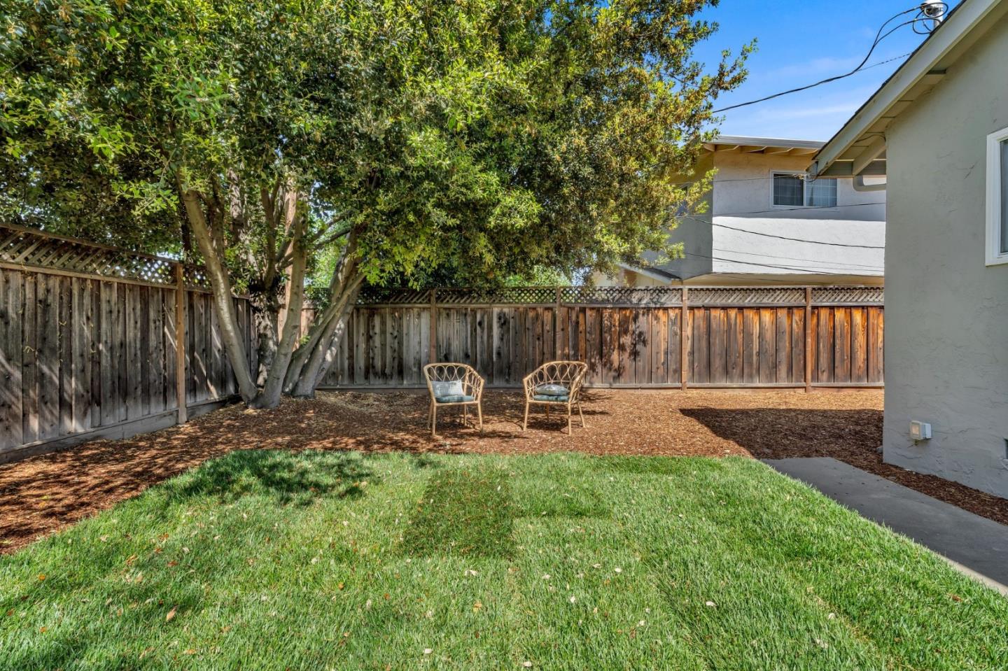 1165 Nadine Drive Campbell, CA 95008 - Photo 46 of 66 a view of a chair and table in backyard