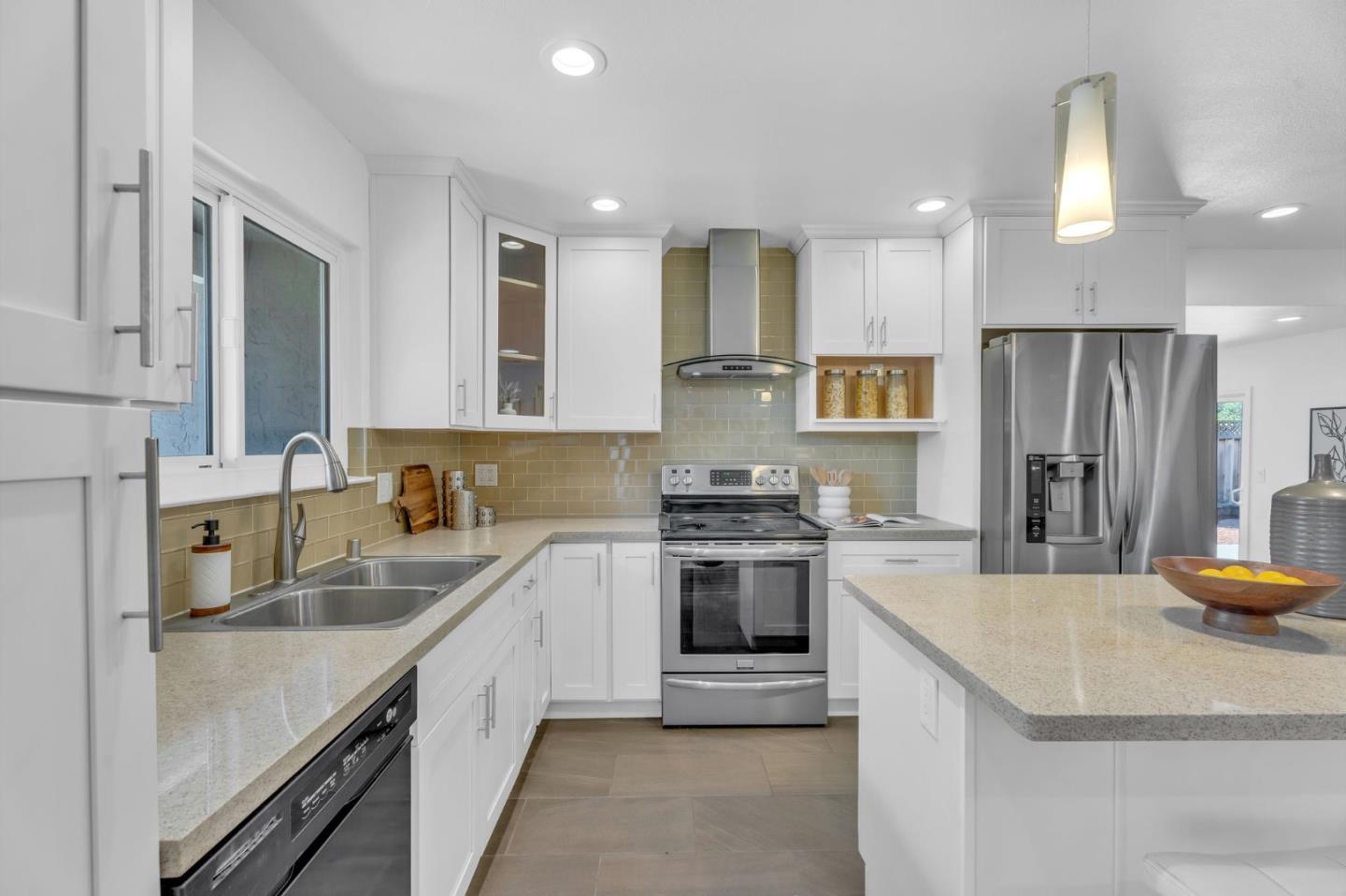 1165 Nadine Drive Campbell, CA 95008 - Photo 9 of 66 a kitchen with a sink stove and refrigerator