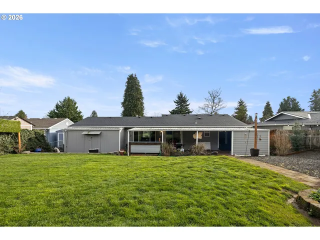 a view of a house with a big yard
