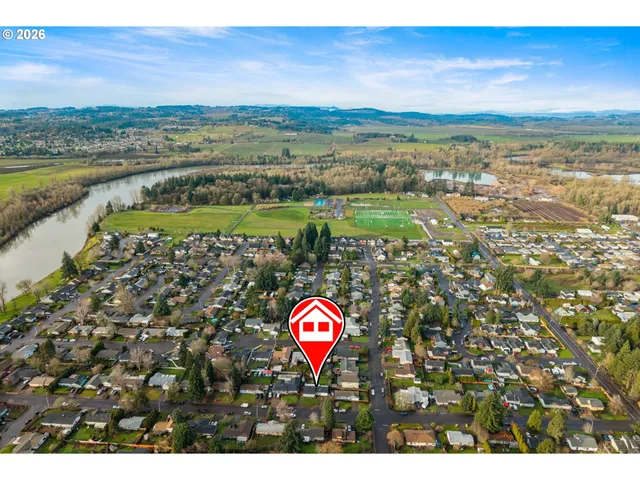 a view of lake with residential houses with outdoor space