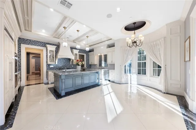 a bathroom with a sink double vanity mirror and a bathtub