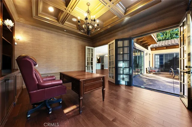 a media room with lots of chairs and a projector screen