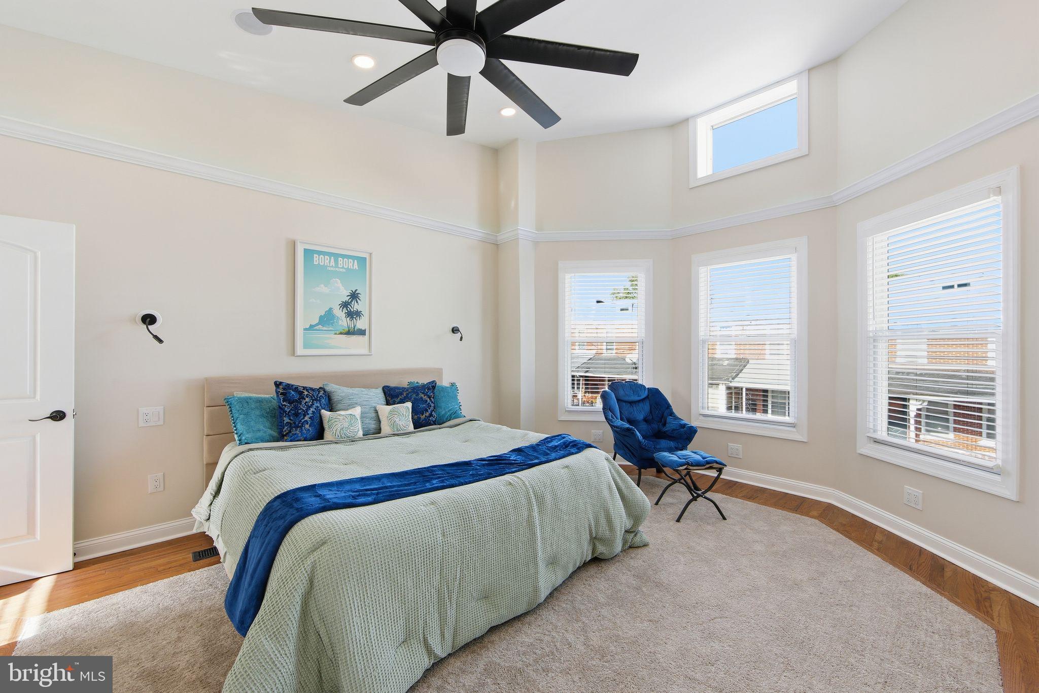 508 Taylor Street Wilmington, DE 19801 - Photo 26 of 46 a bedroom with a bed and wooden floor