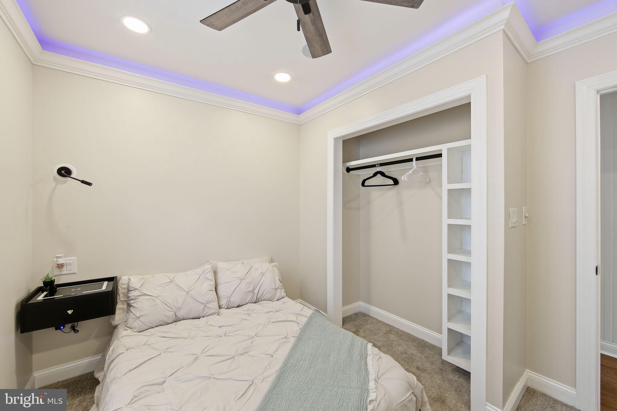 508 Taylor Street Wilmington, DE 19801 - Photo 38 of 46 a bedroom with a bed and a walk in closet