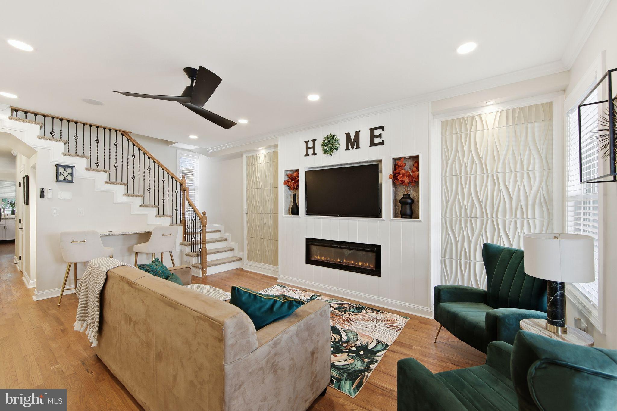 508 Taylor Street Wilmington, DE 19801 - Photo 4 of 46 a living room with furniture fireplace and a flat screen tv