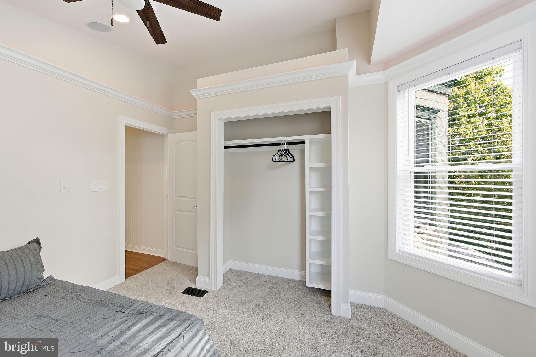 508 Taylor Street Wilmington, DE 19801 - Photo 41 of 46 a bedroom with a bed and a window