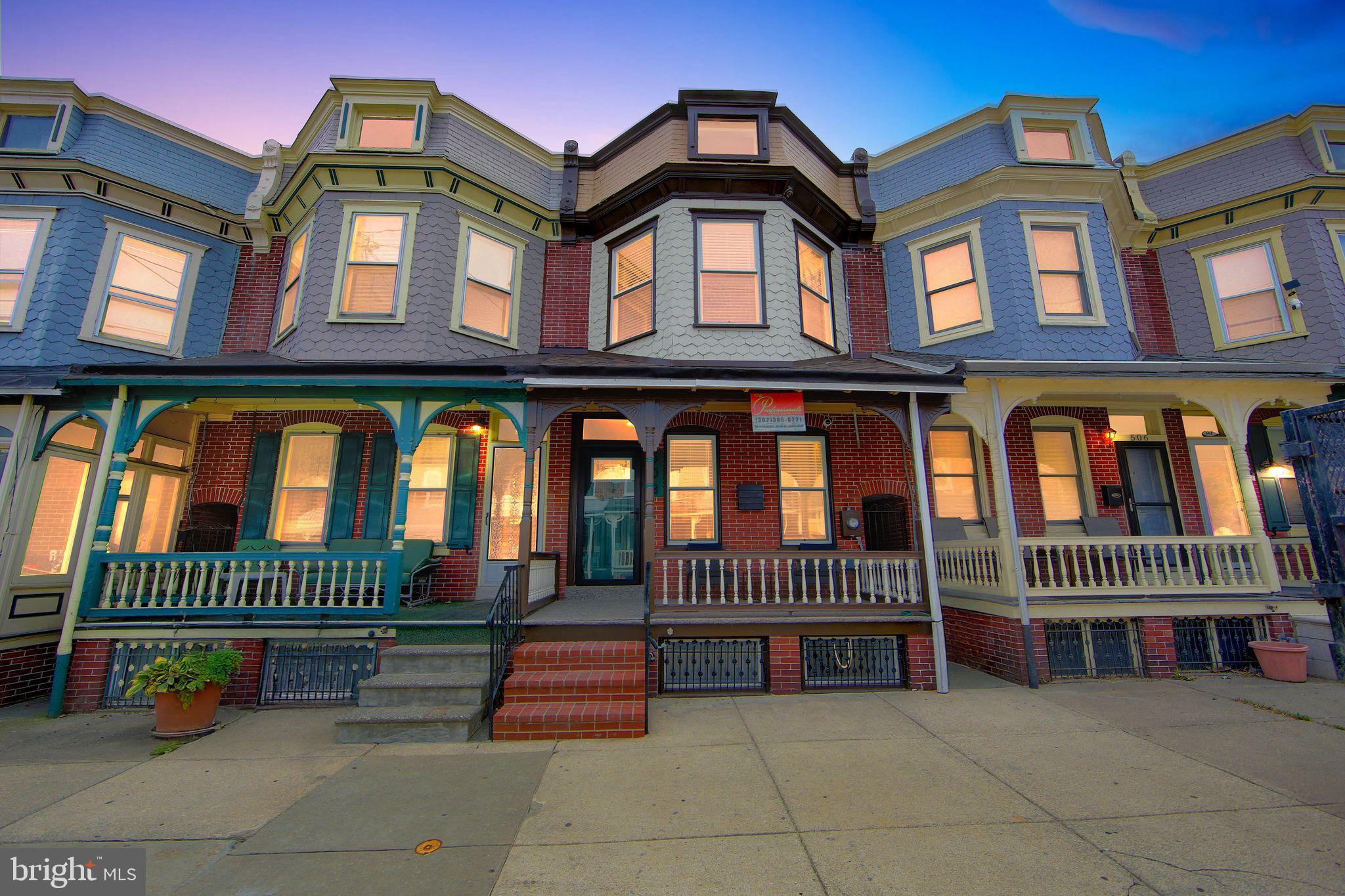 508 Taylor Street Wilmington, DE 19801 - Photo 43 of 46 front view of a house with a fence