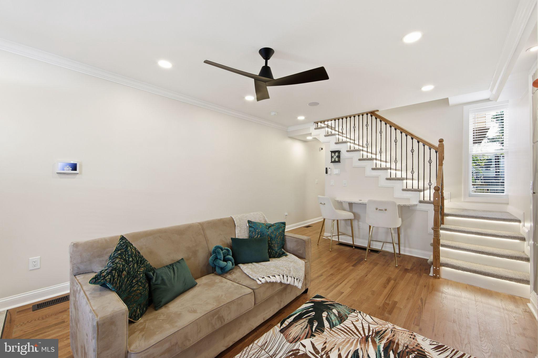 508 Taylor Street Wilmington, DE 19801 - Photo 5 of 46 a living room with furniture and a wooden floor